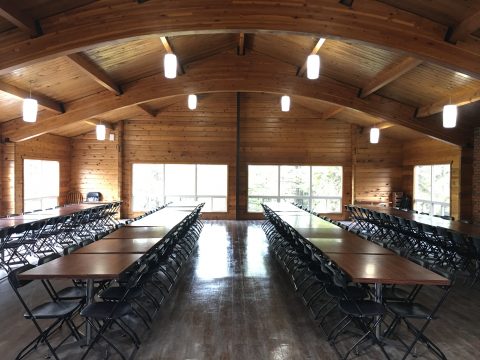 The dinning room has a cozy rustic feel. There is seating for 140 people as well as 7 child booster seats and 2 highchairs.