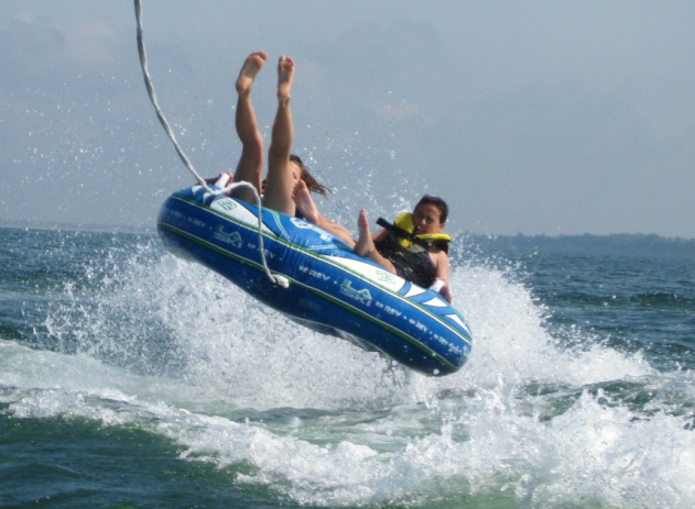 WATER SPORTS - Dandy Auto Marine has been our sponsor for years and has set us up with state of the art boat, ski, board, surf, and tubing equipment! This activity fills up fast and lasts for half a day each day! Try your hand at riding the big wave as you wake-surf!